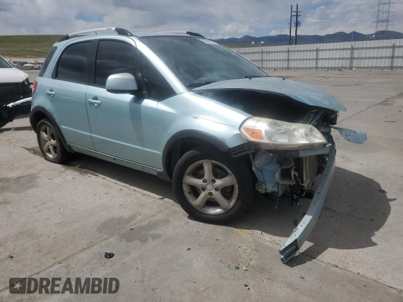 2009 Suzuki SX4 Touring AWD z VIN JS2YB417396203092, wystawiony jako Copart lot #53965685 z przebiegiem 153 701 mil mil oraz Szkoda całkowita • Salvage title. Historia ofert i sprzedaży dostępna na DreamBid. Obrazek 4.
