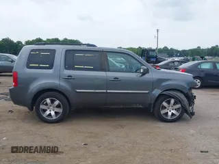 2013 Honda Pilot Touring with VIN 5FNYF3H9XDB024500, listed as a IAAI auction lot 42683695 with 151,441 mi miles and . Bid and sale history available at DreamBid. Image 14.