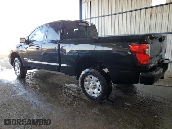 2018 Nissan Titan with VIN 1N6BA1C36JN520674, listed as a Copart auction lot 64722344 with 97,848 mi miles and Clean title. Bid and sale history available at DreamBid. Image 2.