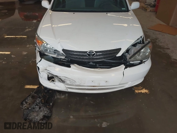 2004 Toyota Camry LE with VIN 4T1BE32K64U339432, listed as a IAAI auction lot 41622306 with 116,442 mi miles. Bid and sale history available at carsss.com. Image 6.