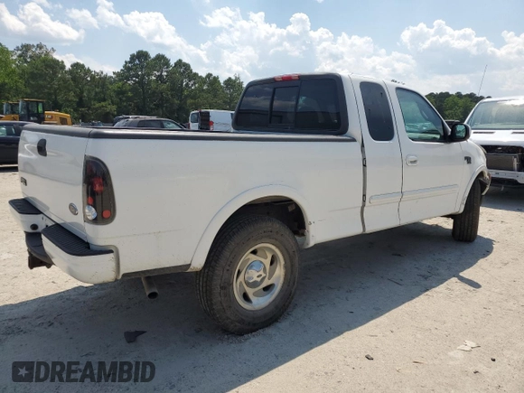 2000 Ford F-150 XL z VIN 1FTRX18L0YNA65615, wystawiony jako Copart lot #58508375 z przebiegiem Nie podano mil oraz Szkoda całkowita • Salvage title. Historia ofert i sprzedaży dostępna na DreamBid. Obrazek 3.