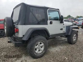 2004 Jeep Wrangler X with VIN 1J4FA39S24P714961, listed as a Copart auction lot 57871235 with 123,164 mi miles and Clean title. Bid and sale history available at DreamBid. Image 3.