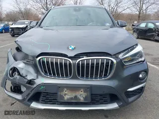 2019 BMW X1 xDrive28i with VIN WBXHT3C51K5L90571, listed as a IAAI auction lot 41909209 with 35,902 mi miles. Bid and sale history available at carsss.com. Image 19.