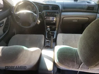 2000 Subaru Legacy L with VIN 4S3BE6352Y6214274, listed as a Copart auction lot 77827604 with 117,520 mi miles and Salvage title. Bid and sale history available at DreamBid. Image 8.