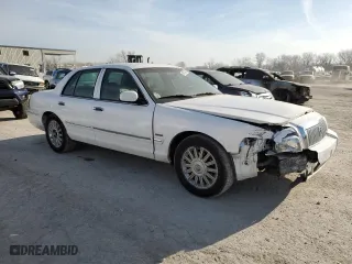 2010 Mercury Grand Marquis LS with VIN 2MEBM7FV7AX614134, listed as a Copart auction lot 48724825 with 129,960 mi miles and Salvage Title. Bid and sale history available at carsss.com. Image 4.