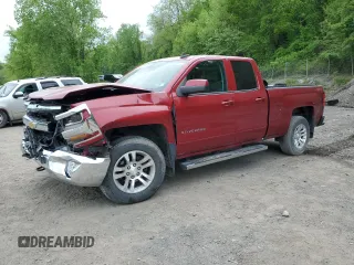 2018 Chevrolet Silverado 1500 LT with VIN 1GCVKRECXJZ255744, listed as a Copart auction lot 55957495 with 75,753 mi miles and Salvage Title. Bid and sale history available at DreamBid. Image 1.