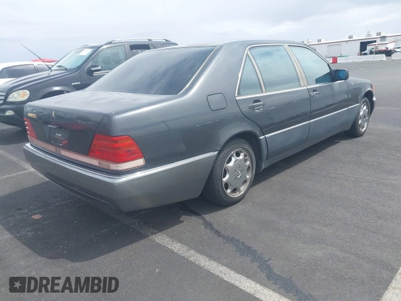 1992 Mercedes-Benz 500 z VIN WDBGA51E0NA023491, wystawiony jako IAAI lot #42058835 z przebiegiem 260 421 mil mil oraz . Historia ofert i sprzedaży dostępna na DreamBid. Obrazek 4.