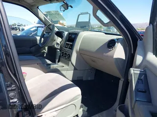 2007 Ford Explorer Sport Trac XLT z VIN 1FMEU31KX7UB62700, wystawiony jako IAAI lot #42344143 z przebiegiem 169 588 mil mil oraz . Historia ofert i sprzedaży dostępna na DreamBid. Obrazek 5.