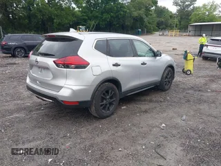 2017 Nissan Rogue SV with VIN KNMAT2MT7HP566140, listed as a IAAI auction lot 42507432 with 166,534 mi miles and . Bid and sale history available at DreamBid. Image 4.