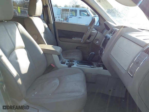2009 Mercury Mariner Hybrid with VIN 4M2CU29359KJ04974, listed as a IAAI auction lot 41737749 with 150,783 mi miles. Bid and sale history available at carsss.com. Image 5.