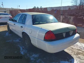 2005 Ford Police Interceptor z VIN 2FAFP71WX5X164985, wystawiony jako IAAI lot #41363721 z przebiegiem 147 950 mil mil oraz . Historia ofert i sprzedaży dostępna na DreamBid. Obrazek 3.