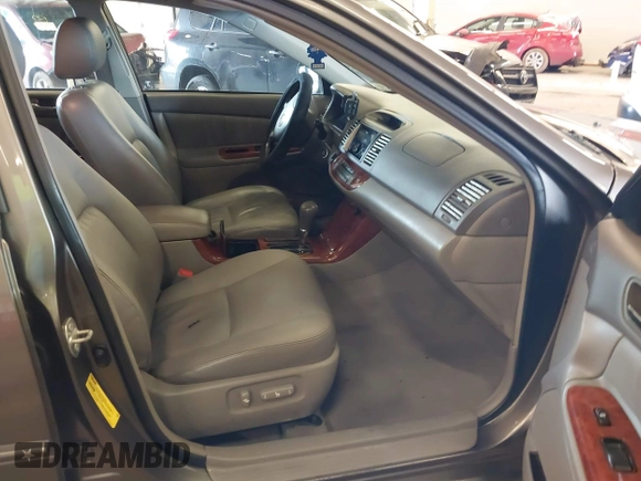 2005 Toyota Camry LE with VIN 4T1BF30K15U591137, listed as a IAAI auction lot 41681990 with 231,555 mi miles and . Bid and sale history available at DreamBid. Image 5.