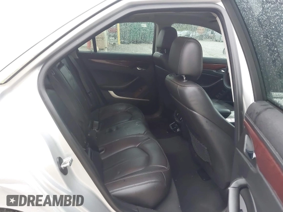 2013 Cadillac CTS Premium with VIN 1G6DP5E37D0153206, listed as a IAAI auction lot 41150664 with 130,194 mi miles and . Bid and sale history available at DreamBid. Image 8.