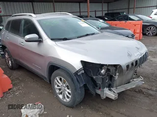2019 Jeep Cherokee Latitude with VIN 1C4PJLCBXKD247676, listed as a IAAI auction lot 41598599 with 149,815 mi miles. Bid and sale history available at carsss.com. Image 1.