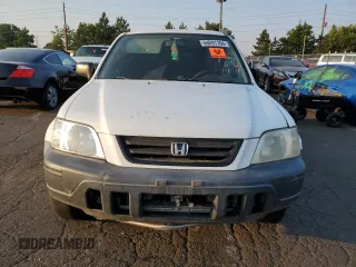 1999 Honda CR-V LX with VIN JHLRD1848XC027046, listed as a Copart auction lot 64091164 with 144,844 mi miles and Salvage Title. Bid and sale history available at carsss.com. Image 5.