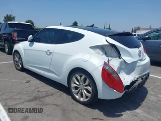 2012 Hyundai Veloster w/Black Int z VIN KMHTC6AD5CU056209, wystawiony jako IAAI lot #42565571 z przebiegiem 137 908 mil mil oraz . Historia ofert i sprzedaży dostępna na DreamBid. Obrazek 3.