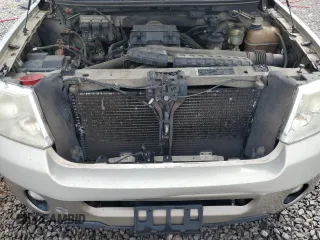 2006 Ford F-150 XLT with VIN 1FTPX12516FA48041, listed as a Copart auction lot 60739995 with 241,248 mi miles and Salvage title. Bid and sale history available at DreamBid. Image 11.