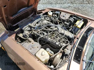 1982 Datsun 280ZX z VIN JN1HZ04S0CX433451, wystawiony jako Copart lot #53912864 z przebiegiem 200 629 mil mil oraz Tytuł czysty. Historia ofert i sprzedaży dostępna na DreamBid. Obrazek 11.