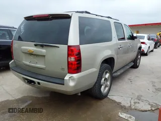 2013 Chevrolet Suburban LT with VIN 1GNSKJE74DR166223, listed as a IAAI auction lot 42172184 with 200,901 mi miles and . Bid and sale history available at DreamBid. Image 4.