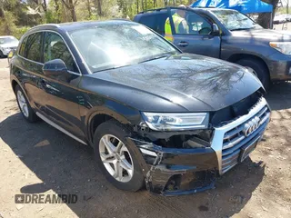 2019 Audi Q5 Premium with VIN WA1ANAFY0K2103123, listed as a IAAI auction lot 42106468 with 90,858 mi miles and . Bid and sale history available at DreamBid. Image 1.