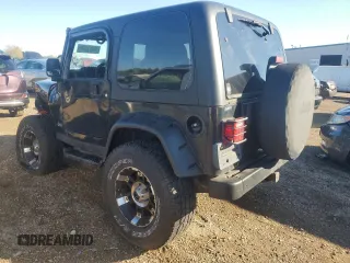 2004 Jeep Wrangler Rubicon with VIN 1J4FA69S44P734355, listed as a Copart auction lot 72381334 with 113,024 mi miles and Salvage Title. Bid and sale history available at carsss.com. Image 2.