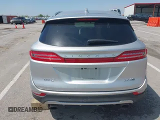 2015 Lincoln MKC with VIN 5LMCJ2A94FUJ16038, listed as a IAAI auction lot 42057400 with 102,848 mi miles. Bid and sale history available at carsss.com. Image 6.