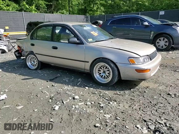 1995 Toyota Corolla DX with VIN 2T1AE09B0SC098739, listed as a Copart auction lot 57653205 with 154,226 mi miles and Salvage title. Bid and sale history available at DreamBid. Image 13.