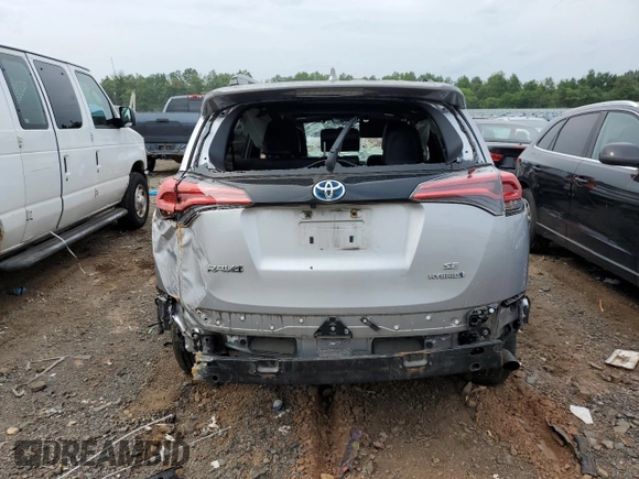2018 Toyota RAV4 Hybrid SE with VIN JTMJJREV6JD238570, listed as a Copart auction lot 63972534 with Not provided miles and Salvage title. Bid and sale history available at DreamBid. Image 6.