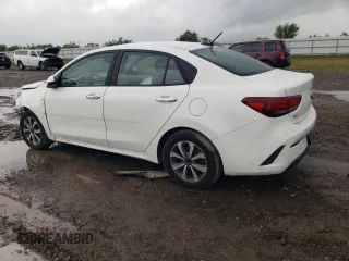 2022 Kia Rio LX with VIN 3KPA24AD1NE501016, listed as a Copart auction lot 80869534 with 64,305 mi miles and Salvage Title. Bid and sale history available at carsss.com. Image 2.