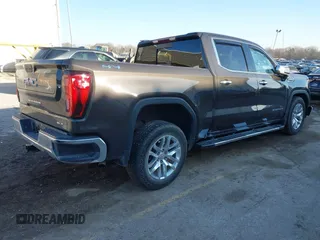 2021 GMC Sierra 1500 SLT z VIN 3GTU9DED9MG176881, wystawiony jako IAAI lot #41140356 z przebiegiem 21 553 mil mil oraz . Historia ofert i sprzedaży dostępna na DreamBid. Obrazek 4.