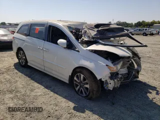 2015 Honda Odyssey Touring Elite z VIN 5FNRL5H90FB033511, wystawiony jako Copart lot #67718683 z przebiegiem Nie podano mil oraz Szkoda całkowita • Salvage title. Historia ofert i sprzedaży dostępna na DreamBid. Obrazek 4.