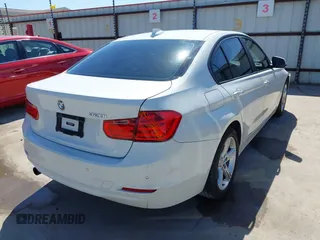 2015 BMW 3 Series 320i with VIN WBA3B1C53FK138341, listed as a IAAI auction lot 41757490 with 125,280 mi miles. Bid and sale history available at carsss.com. Image 4.
