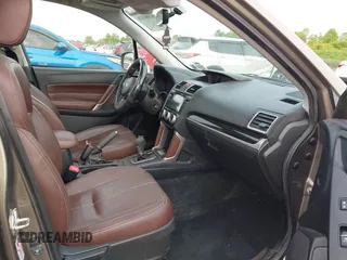 2017 Subaru Forester Touring z VIN JF2SJAWC6HH529707, wystawiony jako IAAI lot #42401138 z przebiegiem 172 868 mil mil oraz . Historia ofert i sprzedaży dostępna na DreamBid. Obrazek 5.