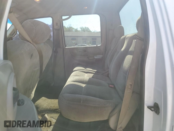 2001 Ford F-150 XLT with VIN 1FTRW07W11KB44405, listed as a Copart auction lot 53560595 with 272,881 mi miles and Salvage title. Bid and sale history available at DreamBid. Image 10.