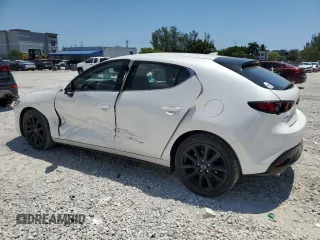 2021 Mazda 3 Premium with VIN JM1BPAML7M1313030, listed as a Copart auction lot 57112895 with 38,251 mi miles and Salvage Title. Bid and sale history available at DreamBid. Image 2.
