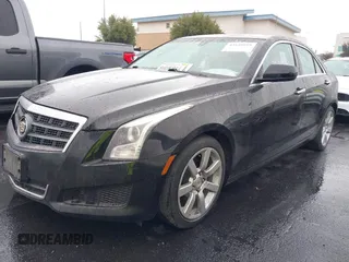 2013 Cadillac ATS z VIN 1G6AA5RA6D0122459, wystawiony jako IAAI lot #41549859 z przebiegiem 144 641 mil mil oraz . Historia ofert i sprzedaży dostępna na DreamBid. Obrazek 2.