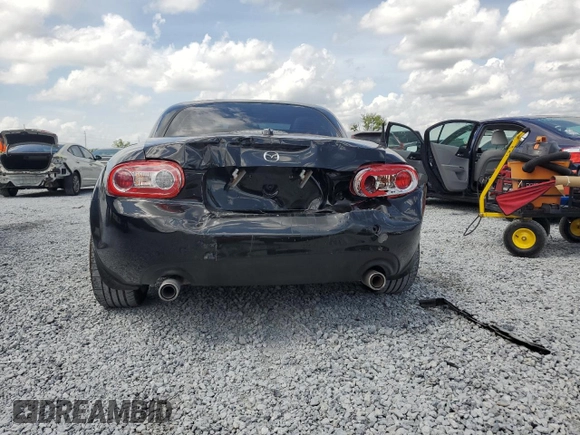 2010 Mazda MX-5 Miata Grand Touring with VIN JM1NC2FF4A0205505, listed as a Copart auction lot 51643095 with 89,054 mi miles and Salvage title. Bid and sale history available at DreamBid. Image 6.