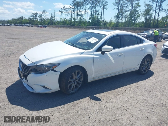2016 Mazda Mazda6 i Grand Touring with VIN JM1GJ1W55G1443186, listed as a IAAI auction lot 42063716 with 114,263 mi miles. Bid and sale history available at carsss.com. Image 17.