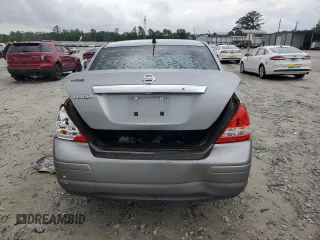 2010 Nissan Versa S z VIN 3N1BC1AP2AL451326, wystawiony jako Copart lot #54434045 z przebiegiem 117 080 mil mil oraz Szkoda całkowita • Salvage title. Historia ofert i sprzedaży dostępna na DreamBid. Obrazek 6.