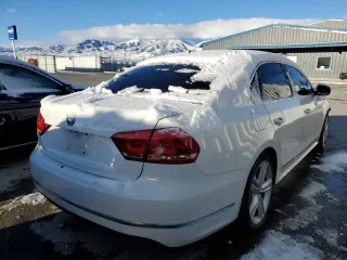 2013 Volkswagen Passat TDI SEL Premium with VIN 1VWCN7A36DC025180, listed as a Copart auction lot 48336875 with 130,912 mi miles and Salvage Title. Bid and sale history available at carsss.com. Image 3.