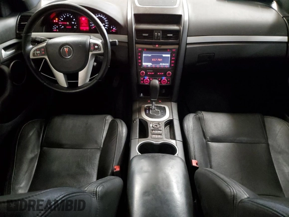 2009 Pontiac G8 z VIN 6G2ER57739L205634, wystawiony jako Copart lot #58935145 z przebiegiem 181 490 mil mil oraz Czysty tytuł • Clean title. Historia ofert i sprzedaży dostępna na DreamBid. Obrazek 8.