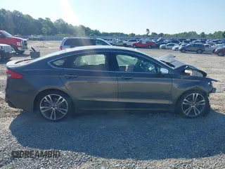 2020 Ford Fusion Titanium with VIN 3FA6P0K91LR175109, listed as a IAAI auction lot 42267532 with 75,000 mi miles and . Bid and sale history available at DreamBid. Image 13.