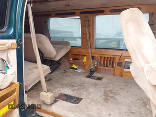 1994 GMC Vandura z VIN 1GDEG25K2RF523677, wystawiony jako IAAI lot #42500077 z przebiegiem 184 965 mil mil oraz . Historia ofert i sprzedaży dostępna na DreamBid. Obrazek 8.