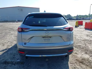2016 Mazda CX-9 Signature with VIN JM3TCBEY7G0120023, listed as a IAAI auction lot 42431039 with 160,276 mi miles and . Bid and sale history available at DreamBid. Image 16.