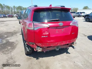 2016 Toyota RAV4 XLE with VIN JTMWFREV6GJ099056, listed as a IAAI auction lot 41941541 with 137,154 mi miles. Bid and sale history available at carsss.com. Image 6.