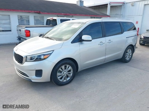 2017 Kia Sedona LX with VIN KNDMB5C10H6265281, listed as a IAAI auction lot 41723985 with 144,958 mi miles. Bid and sale history available at carsss.com. Image 2.