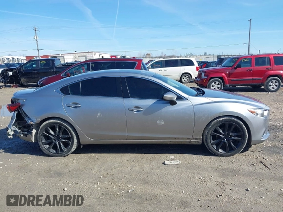 2015 Mazda 6 i Grand Touring with VIN JM1GJ1W68F1170459, listed as a IAAI auction lot 41759915 with 109,911 mi miles and . Bid and sale history available at DreamBid. Image 14.