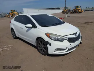 2014 Kia Forte EX with VIN KNAFX4A89E5232153, listed as a IAAI auction lot 41902512 with 133,978 mi miles. Bid and sale history available at carsss.com. Image 1.