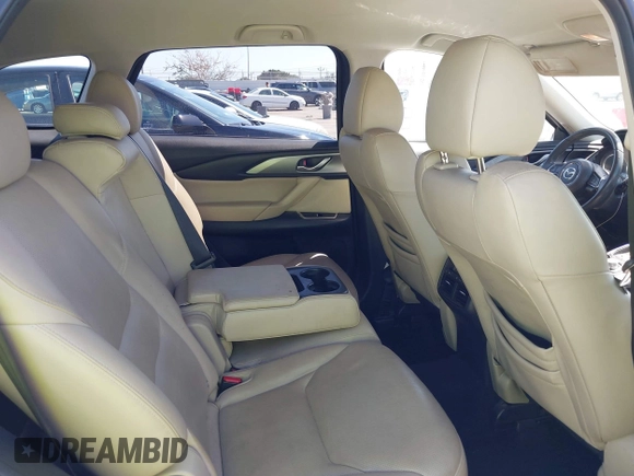 2019 Mazda CX-9 Touring with VIN JM3TCACY5K0306424, listed as a IAAI auction lot 42150466 with 95,166 mi miles and . Bid and sale history available at DreamBid. Image 8.