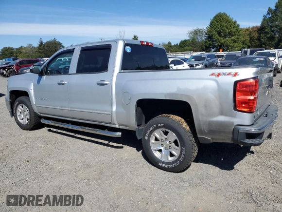 2015 Chevrolet Silverado 1500 LT with VIN 3GCUKREH2FG242873, listed as a Copart auction lot 73356814 with 131,045 mi miles and Salvage Title. Bid and sale history available at DreamBid. Image 2.